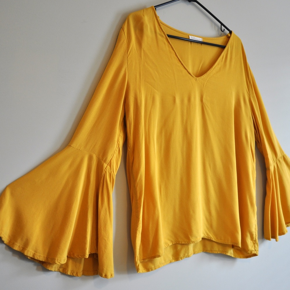 Marigold yellow bell-sleeved flowy top